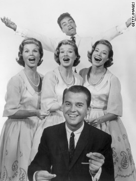 Clark, front, with the McGuire Sisters and Johnny Mathis circa 1955. 