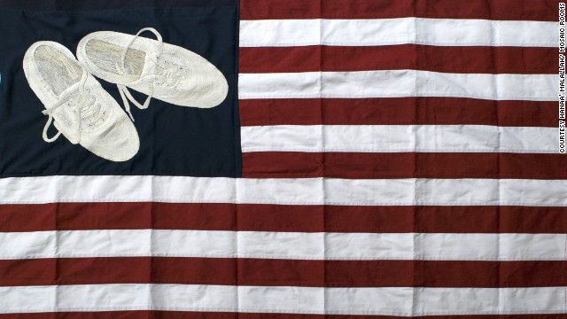 Images of Hanaa' Malallah's shoes appear in many of her artworks, including being embroidered in "USA Heritage Flag," from 2012. Malallah is fascinated with the 2008 incident when an Iraqi journalist threw shoes at former President George W. Bush. "Shoes are our way of resistance," said Malallah.