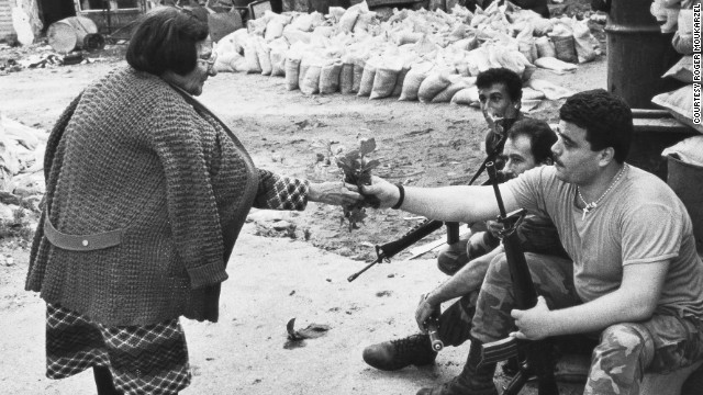 He says he has always been primarily interested in taking pictures of people and "capturing moments of humanity" -- such as this striking exchange from 1978 between a Lebanese soldier and a woman in war-torn Beirut. 