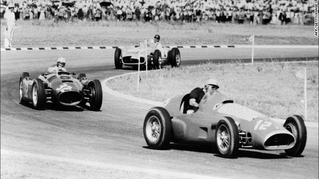 Fangio, pictured in second place, races the original Silver Arrow at the Buenos Aires track in 1955. The Argentine didn't disappoint his home crowd, later taking the title.<br/><br/>