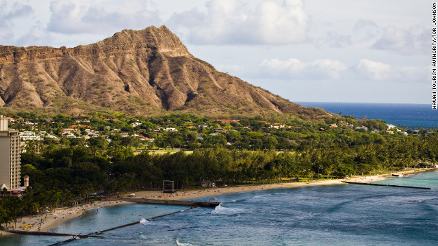 Diamond Head State Monument looms over Waikiki's coastline on the Hawaiian island of Oahu. While getting to the islands is bound to be expensive, it only costs $1 to visit Diamond Head on foot.