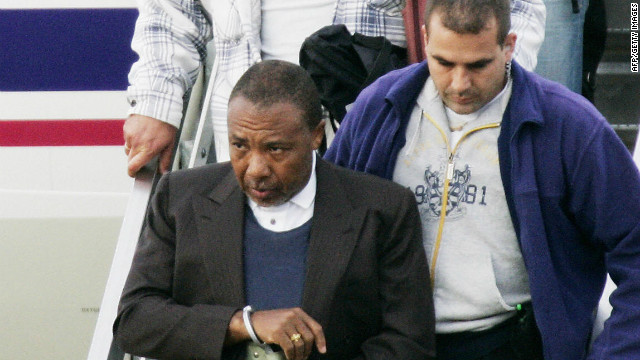 Charles Taylor arrives at Rotterdam Airport in June 2006 for his war crimes trial following his arrest in Nigeria.