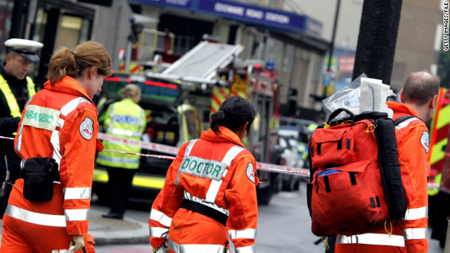 Emergency workers arrive at Edgware Road following an explosion in London's subway on July 7, 2005.