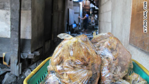 'Garbage chicken' a staple for Manila's poor 
