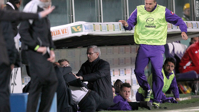 Delio Rossi lashes out at Adem Ljajic in the dug out after the midfielder sarcastically applauded his decision to replace him on the pitch. The outburst cost the Fiorentina coach Rossi his job.