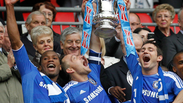 Chelsea's old guard of Didier Drogba (left), captain John Terry (center) and Frank Lampard celebrate Saturday's FA Cup win.