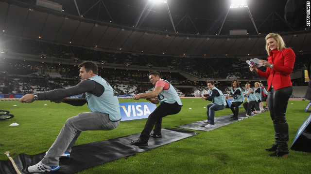 Logan looks on as her husband Kenny, a former rugby union international, competes in a celebrity tug-of-war. About 40,000 spectators watched entertainers including impressionist Jon Culshaw, actor Hugh Bonneville, former Spice Girl Melanie C, rapper Chipmunk and comedian Jack Whitehall. <br/><br/><br/><br/>