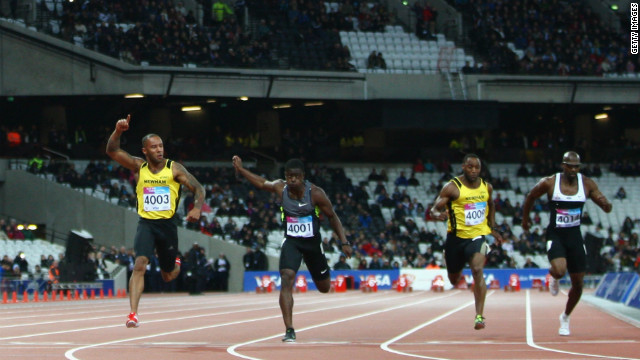 James Ellington, left, celebrates winning the men's 100 meters final during the weekend's BUCS VISA Athletics Championships, one of the Olympic test events.