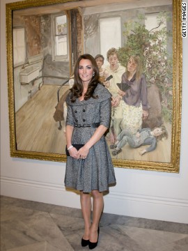 Wearing a gray coatdress, the Duchess of Cambridge posed for pictures at the National Portrait Gallery in London on February 8.