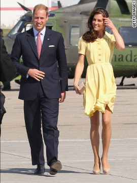 Kate almost had a wardrobe malfunction when the pair arrived in Calgary that day. The skirt of her canary yellow Jenny Packham dress kept blowing up in the wind.