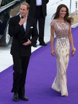 Stepping out in another Jenny Packham gown, Kate attends a gala at London's Kensington Palace with William on June 9.