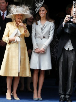 Camilla, duchess of Cornwall, and Kate attend the Order of the Garter Service on June 13 2011. Kate wore a silver coat and fascinator.