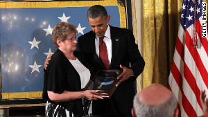 President Barack Obama presents the Medal of Honor to Rose Mary Sabo-Brown.