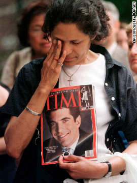 A woman cries at a public memorial Mass in New York for John F. Kennedy Jr. in 1999. He died in a plane crash off the coast of Martha's Vineyard in Massachusetts. His wife and sister-in-law were also killed.