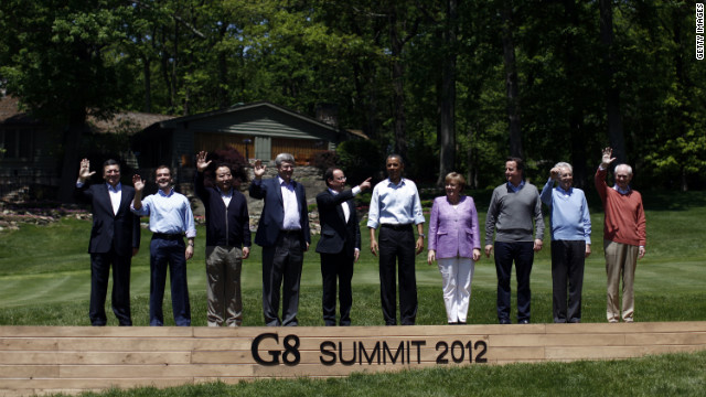 The 10 members of the G8 Summit pose for a group portait at Camp David, Maryland. Left to right: European Commission President Jose Manuel Barroso, Russian Prime Minister Dmitry Medvedev, Japanese PM Yoshihiko Noda, Canadian PM Stephen Harper, French President Francois Hollande, U.S. President Barack Obama, German Chancellor Angela Merkel, British PM David Cameron, Italian PM Mario Monti and European Council President Herman Van Rompuy.