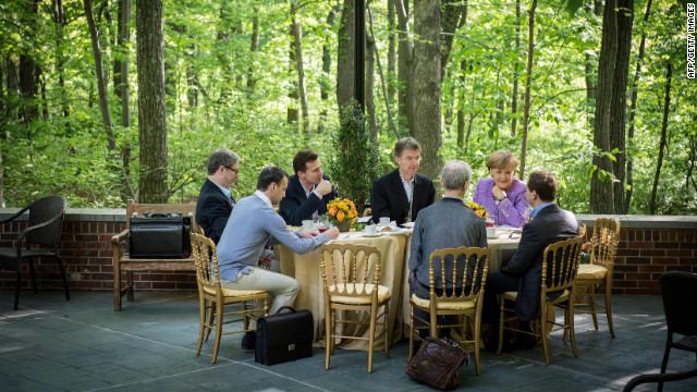 Merkel, second from right, talks with Medvedev, right, during a bilateral meeting on the sidelines of the G8 Summit.