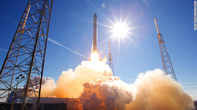 SpaceX's Falcon 9, carrying a Dragon space capsule, launches from Cape Canaveral in December 2010. 