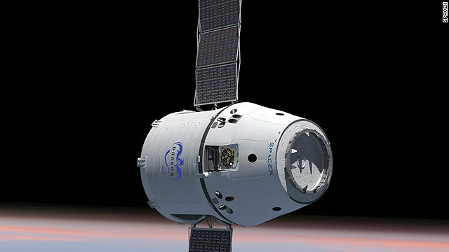 This rendering of the Dragon capsule shows the craft's solar panels fully extended. The capsule launched in May extended its panels in orbit.