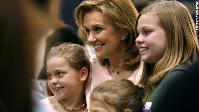 Edwards' wife, Elizabeth, meets with children after a town-hall gathering in Iowa in 2007. She passed away in 2010 from breast cancer after separating from Edwards.