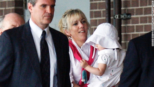 Rielle Hunter, Edwards' former mistress, holds their daughter, Frances Quinn Hunter, in August 2009. Prosecutors accused Edwards of using nearly $1 million in illegal campaign contributions to keep his pregnant mistress under wraps as he ran for president in 2008. Defense attorneys argued the donations could not be considered campaign contributions. They said Edwards was guilty of being a bad husband but had committed no crime.