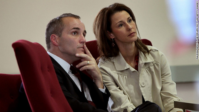 Former Edwards aide Andrew Young and his wife, Cheri, listen during a 2010 hearing in North Carolina. Defense attorneys argued that Young used the money for his own gain and to pay for Hunter's medical expenses to hide the affair from Edwards' wife.