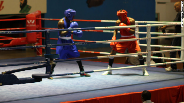 Boxers in Cuba fight at an exhibition match on May 10, 2012. Despite the fact that fighters cannot compete professionally, the country has consistently produced world-class boxers.