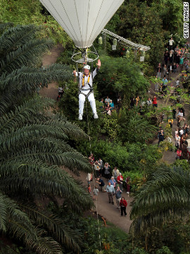 Television presenter Ben Fogle made a dramatic entrance as he carried the flame in a hot air balloon inside the rainforest biome -- known as the Eden Project -- in Cornwall, on day two of the relay.