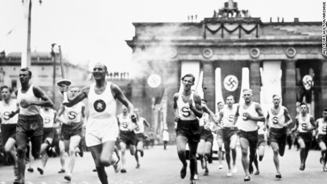 The torch relay was first used at the 1936 Olympics in Berlin, an idea instigated by Germany's then Nazi government. The flame was lit in Olympia, Greece, then carried to the Berlin stadium by runners through Bulgaria, Yugoslavia, Hungary, Austria and Czechoslovakia -- countries that would later fall under Hitler.