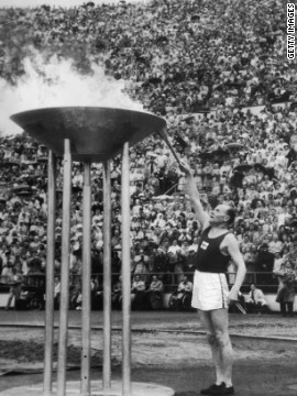 Finnish runner Paavo Nurmi lights the cauldron at the 1952 Helsinki Olympics. It was the first time the flame had been transported by plane. Since then it has been transformed into a radio signal for the 1976 Montreal Olympics and carried underwater by divers during the 2000 Sydney Games.