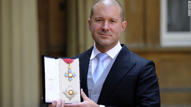 Sir Jonathan Ive holds his Knight Commander medal following a ceremony at Buckingham Palace, on May 23, 2012 in London.