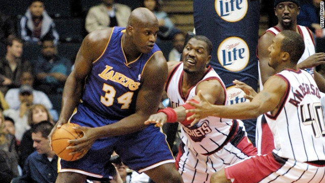 It maintained the tradition of America's "Dream Team." The 1996 lineup included Houston Rockets' Hakeem Olajuwon (center) and Shaquille O'Neal of the Lakers.