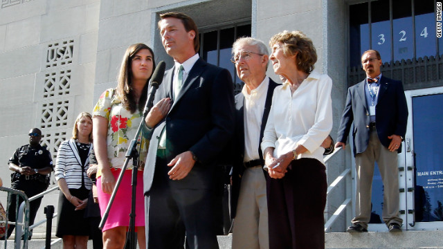 Edwards addresses the media after his acquittal and mistrial, with his daughter Cate and his parents Wallace and Bobbie Edwards at his side, outside the Greensboro courthouse on Thursday, May 31, 2012. After nine days of deliberation, a jury acquitted Edwards on one count but deadlocked on five other counts in his corruption trial. It's unclear what the Justice Department will do next, but Edwards says his years of service aren't over.