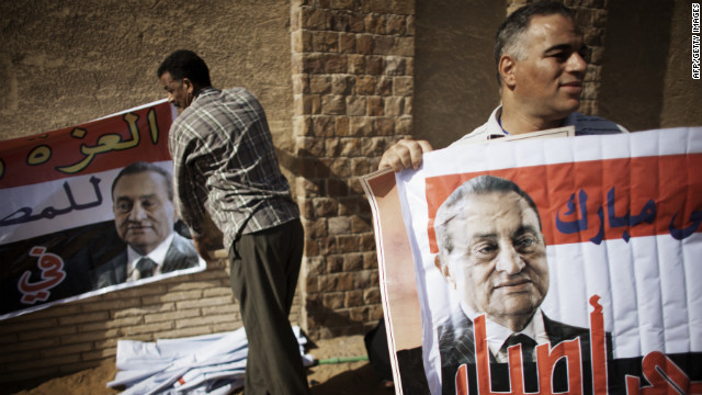 Mubarak supporters rally outside of the courthouse after news of the verdict was handed down.