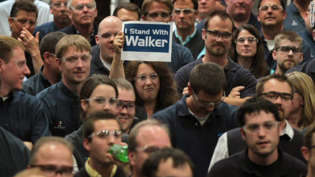  A worker shows her support for Wisconsin Gov. Scott Walker at one of his campaign stops last week in Sussex, Wisconsin. 