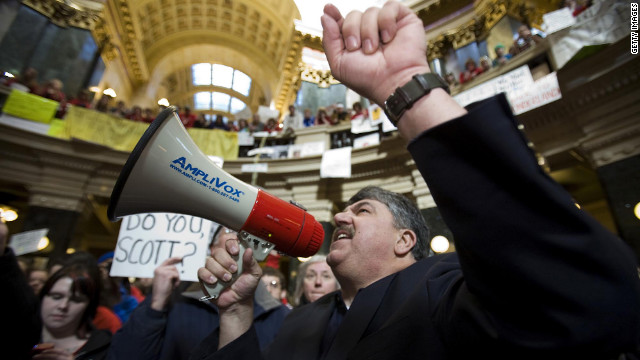 Richard Trumka, national AFL-CIO president, speaks to protesters in the capital rotunda during a rally in opposition to Walker's proposal.