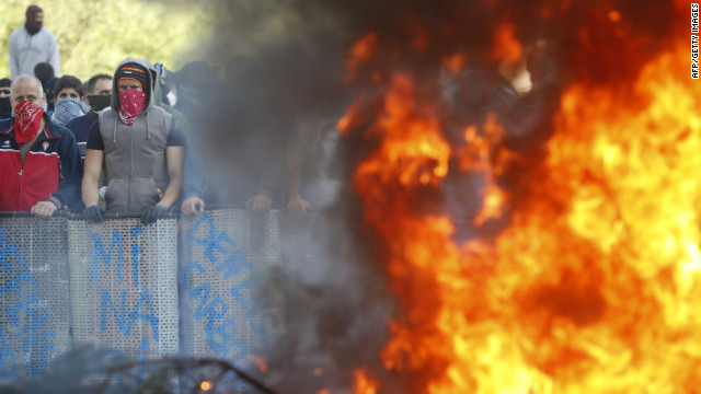 Spanish miners burn tires during an anti-austerity demonstration in Vega del Rey, near Oviedo, in northern Spain on June 4, 2012. 