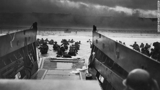 American troops storm the beaches of Normandy, France, on June 6, 1944. D-Day was the largest seaborne invasion in history. More than 150,000 Allied troops -- about half of them Americans -- invaded Western Europe, overwhelming German forces in an operation that proved to be a turning point in World War II.