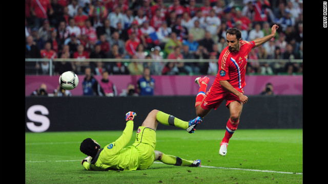 Roman Shirokov of Russia scores the team's second goal past Petr Cech of Czech Republic.