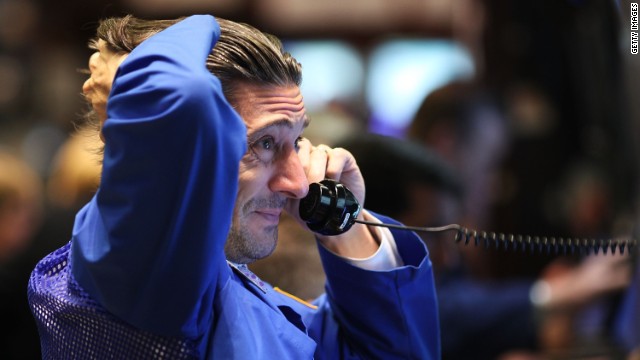 A trader works on the floor of the New York Stock Exchange.