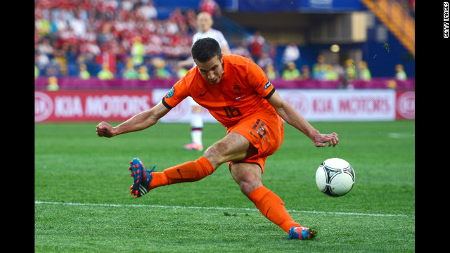 Robin van Persie of the Netherlands misses a chance at goal against Denmark.