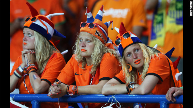 Dutch fans look dejected at the final whistle during the Netherlands-Denmark match.