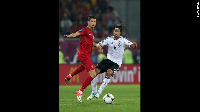 Cristiano Ronaldo of Portugal and Sami Khedira of Germany fight for the ball in a match on Saturday, June 9.