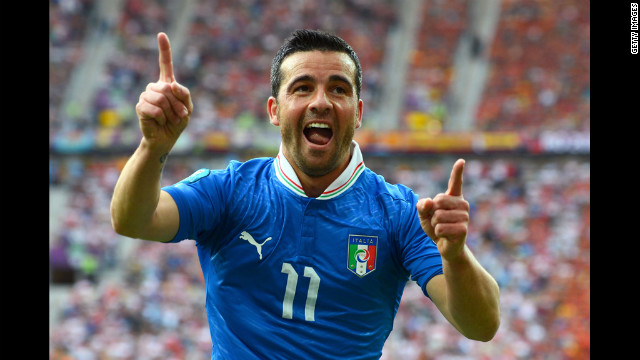Antonio Di Natale celebrates after scoring Italy's first goal against Spain. Spain was held to a 1-1 draw.
