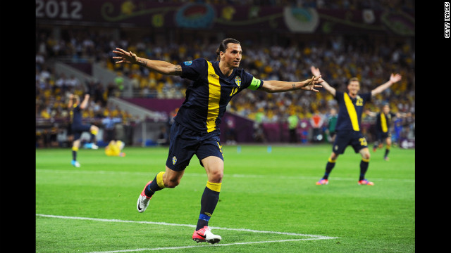 Zlatan Ibrahimovic celebrates scoring Sweden's first goal against Ukraine.
