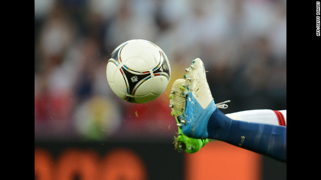 Players compete for control of the ball during the England-France match on Monday.