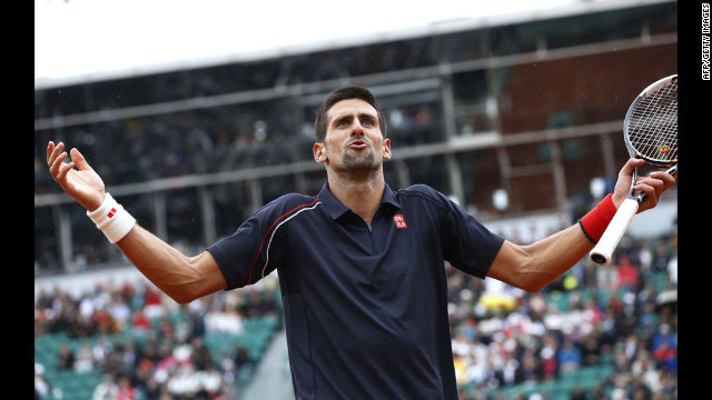 Djokovic reacts in frustration late in the match against Nadal.