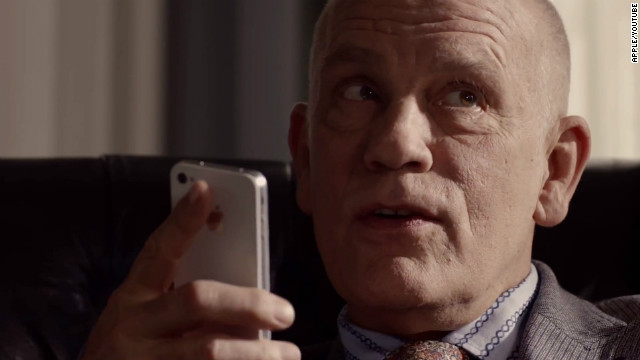 Actor John Malkovich talks to his iPhone 4S in a current TV ad for Apple.