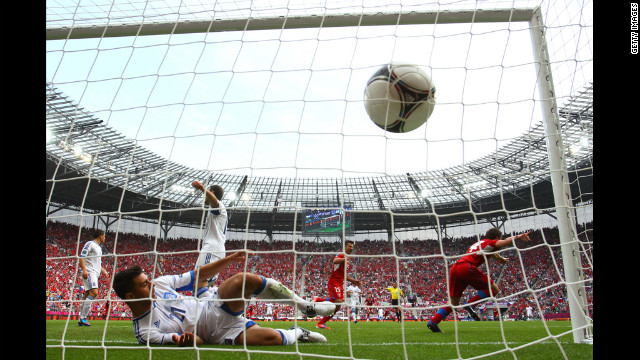 The Czech Republic's Vaclav Pilar, right, scores the second goal of the match against Greece.