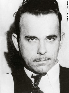 John Dillinger, gangster and bank robber, was the first criminal to be called Public Enemy No. 1 by the FBI. Bureau agents gunned him down outside a movie theater in 1934. 