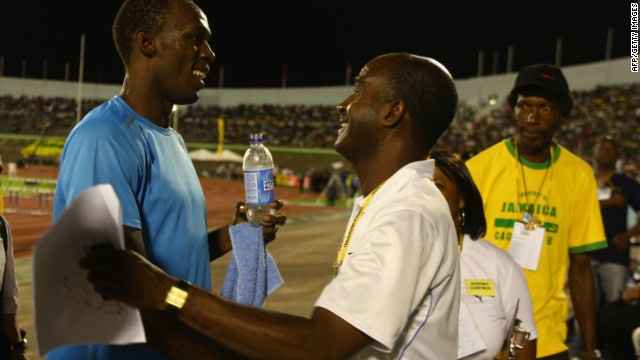 Bolt greets his inspiration, 1976 Olympic 200m champion Don Quarrie. 